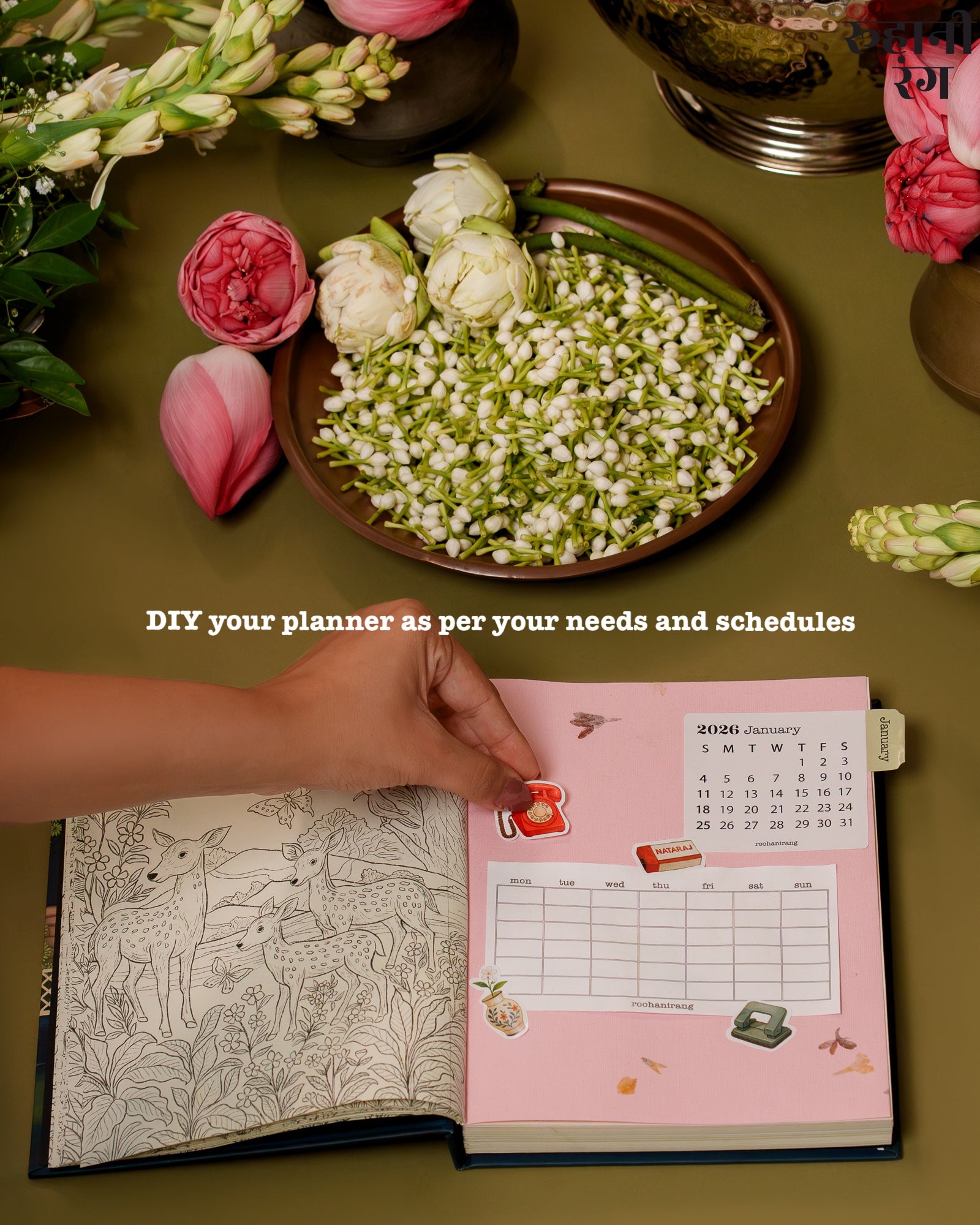 January 2026 calendar spread of Roohanirang handmade planner with pressed flower paper and coloring illustration.
