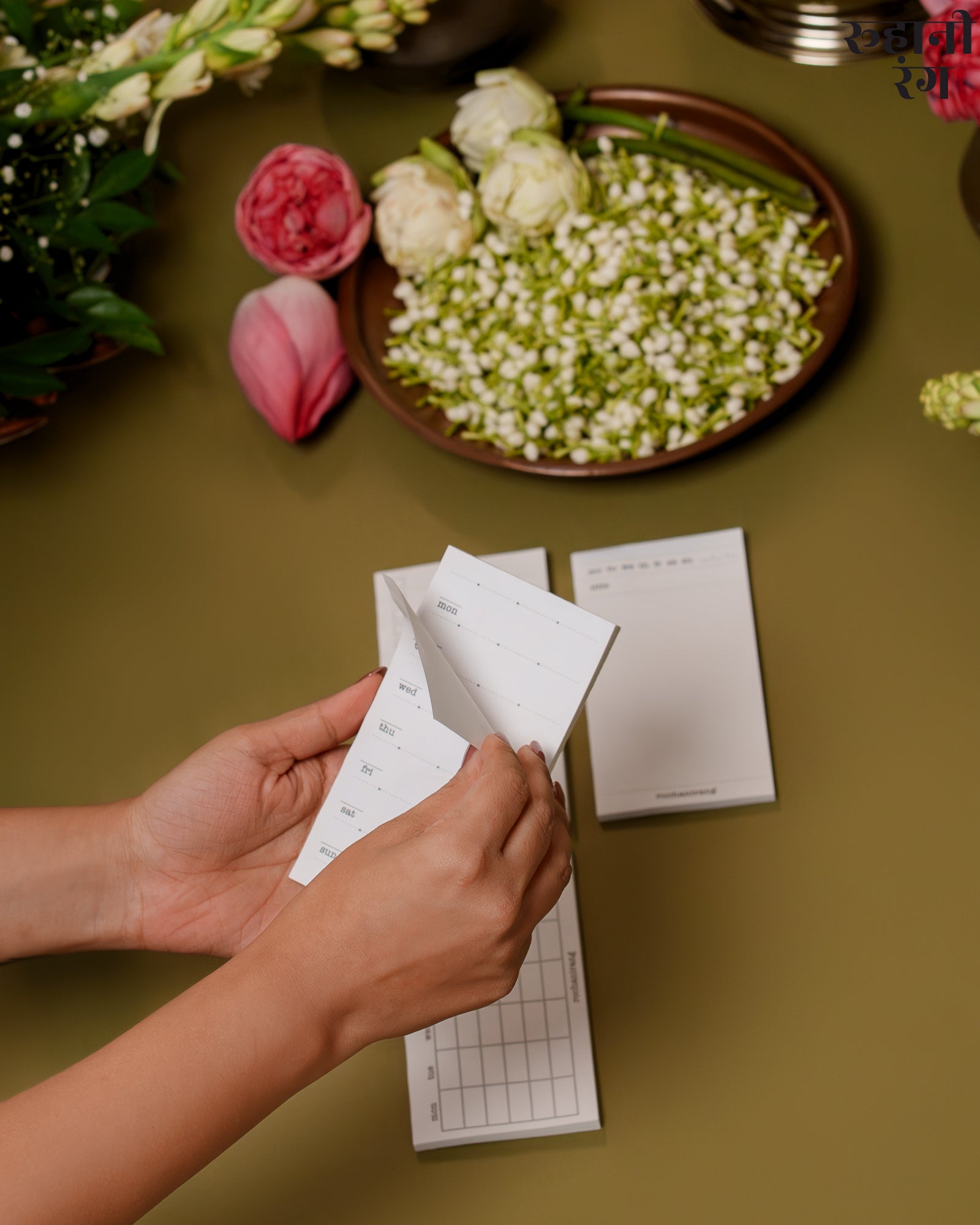Eco-friendly 2026 planner by Roohanirang on desk with pens and art supplies for mindful journaling